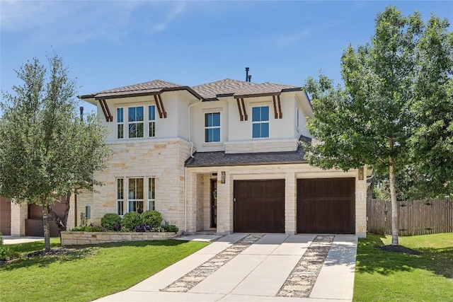 12404 Cardinal Flower Dr, Austin, TX 78739 - view of front facade with driveway, stone siding, an attached garage, and stucco siding