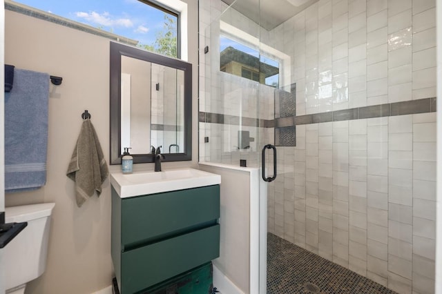 1700 S 3rd St, Austin, TX 78704 - bathroom featuring a stall shower, vanity, and toilet