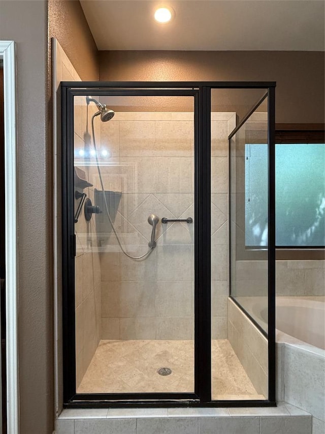 2222 Garden Gate Cir, New Braunfels, TX 78130 - full bathroom featuring a shower stall, a garden tub, and recessed lighting