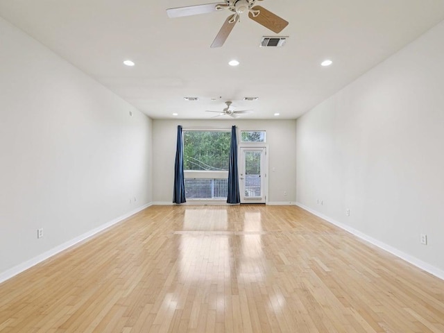 2931 E 12th St Unit 206, Austin, TX 78702 - spare room featuring a ceiling fan, baseboards, light wood finished floors, and recessed lighting