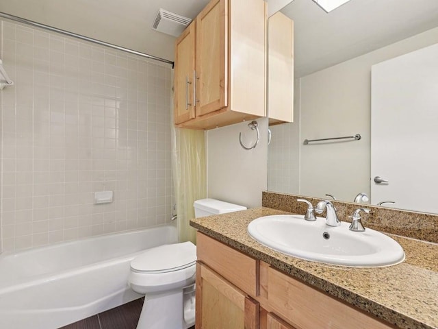 2931 E 12th St Unit 206, Austin, TX 78702 - full bathroom featuring toilet, vanity, and shower / bathtub combination with curtain