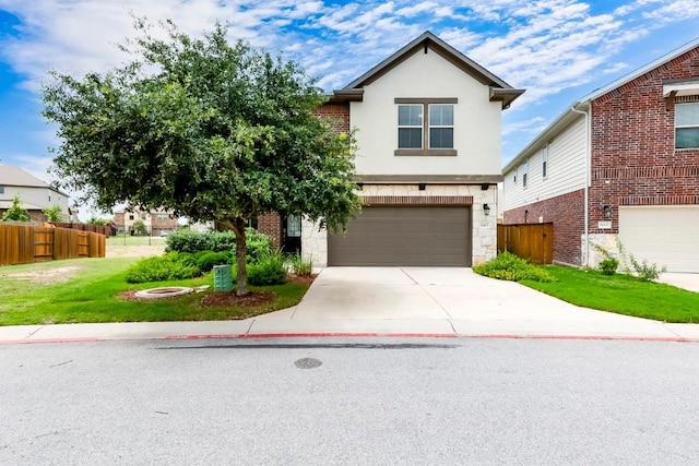 14400 Mccoy Loop, Austin, TX 78717 - traditional home featuring a garage, driveway, and stucco siding