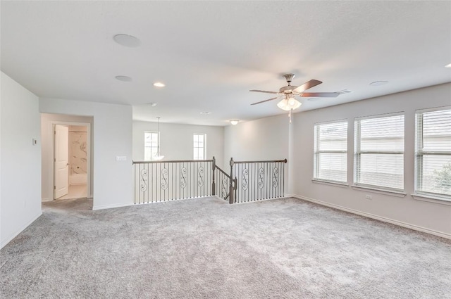 14400 Mccoy Loop, Austin, TX 78717 - empty room with carpet floors, ceiling fan, baseboards, and recessed lighting