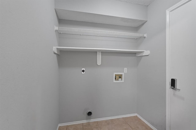 913 Dover Pass, Cedar Park, TX 78613 - washroom with electric dryer hookup, washer hookup, baseboards, and tile patterned flooring