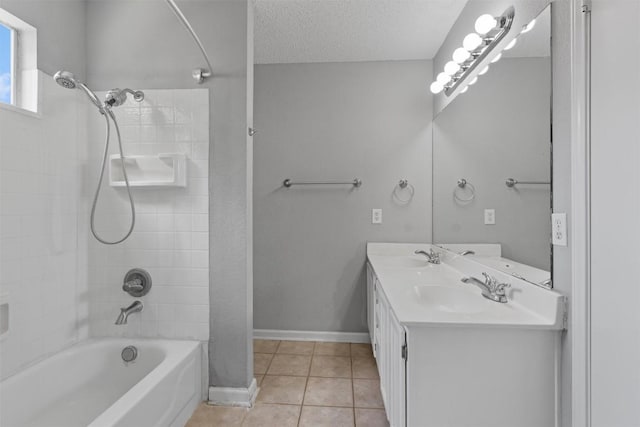913 Dover Pass, Cedar Park, TX 78613 - bathroom featuring tile patterned floors, shower / bathtub combination, double vanity, baseboards, and a textured ceiling