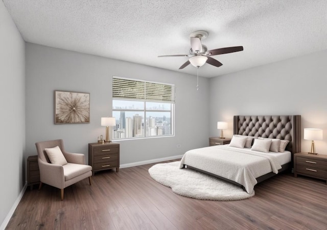 913 Dover Pass, Cedar Park, TX 78613 - bedroom with wood finished floors, baseboards, a textured ceiling, and a ceiling fan