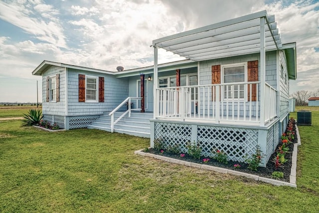 TBD-TRACT2 Rabbs Prairie Rd, La Grange, TX 78945 - view of front of house featuring covered porch, a front lawn, and central AC unit