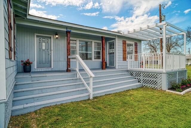 TBD-TRACT2 Rabbs Prairie Rd, La Grange, TX 78945 - doorway to property with covered porch, a yard, and a pergola