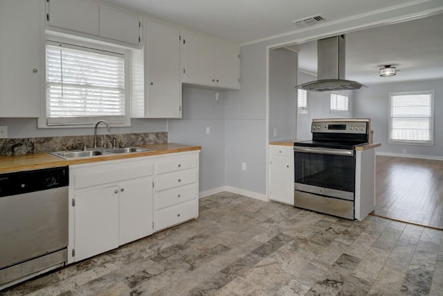 TBD-TRACT2 Rabbs Prairie Rd, La Grange, TX 78945 - kitchen featuring stainless steel appliances, island exhaust hood, a sink, white cabinets, and baseboards