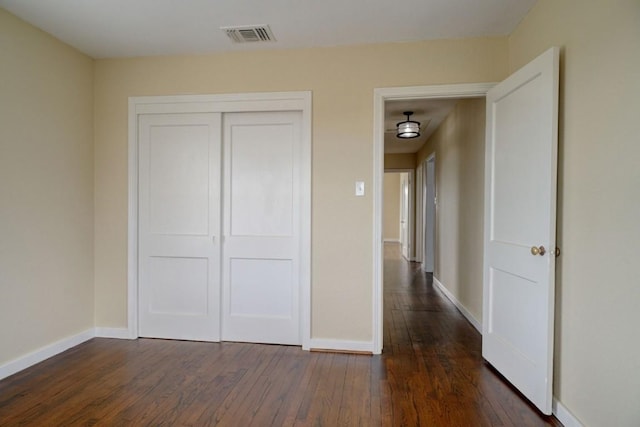 TBD-TRACT2 Rabbs Prairie Rd, La Grange, TX 78945 - unfurnished bedroom featuring dark wood-type flooring, baseboards, and a closet