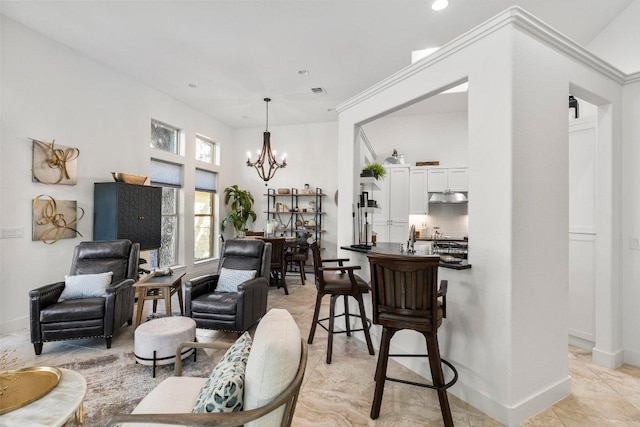 2606 Deep Cyn, Horseshoe Bay, TX 78657 - living room with a chandelier, recessed lighting, and baseboards