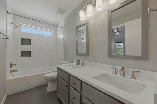 339 Precipice Way, Georgetown, TX 78626 - full bath featuring toilet, bathtub / shower combination, double vanity, and tile patterned flooring