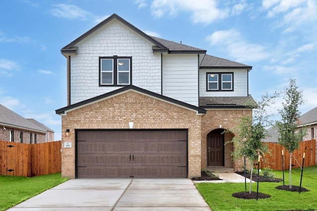 3917 Torraca Ln, Round Rock, TX 78665 - traditional home featuring driveway, brick siding, and roof with shingles