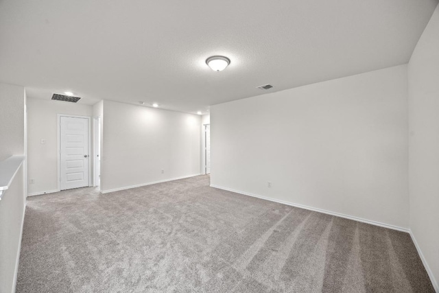 3917 Torraca Ln, Round Rock, TX 78665 - carpeted empty room featuring baseboards and recessed lighting