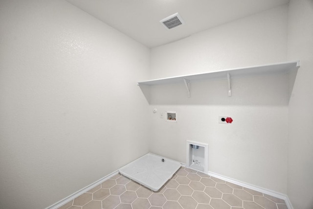 3917 Torraca Ln, Round Rock, TX 78665 - washroom with gas dryer hookup, electric dryer hookup, washer hookup, and tile patterned floors