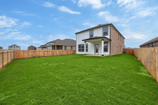 3917 Torraca Ln, Round Rock, TX 78665 - rear view of property featuring a fenced backyard and a patio area
