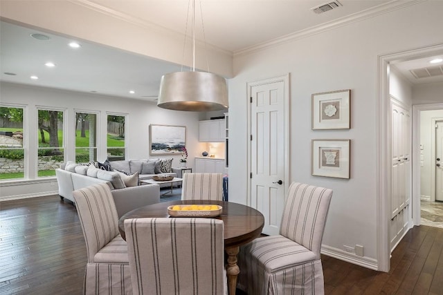 507 Konstanty Cir, West Lake Hills, TX 78746 - dining space with dark wood-style floors, baseboards, crown molding, and recessed lighting