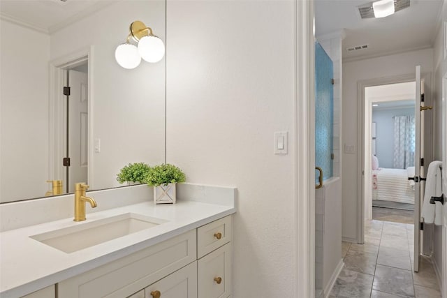 507 Konstanty Cir, West Lake Hills, TX 78746 - ensuite bathroom with crown molding, vanity, marble look tiles, and a shower