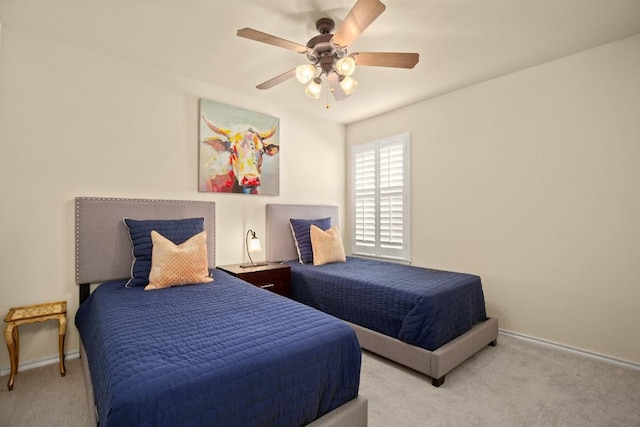 38 White Magnolia Cir, Austin, TX 78734 - bedroom with carpet, baseboards, and a ceiling fan