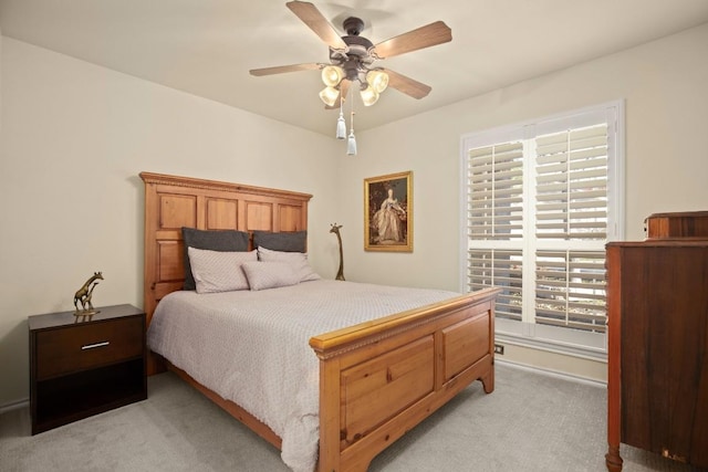 38 White Magnolia Cir, Austin, TX 78734 - bedroom with light colored carpet and a ceiling fan