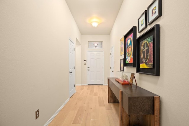 38 White Magnolia Cir, Austin, TX 78734 - entryway featuring light wood finished floors and baseboards