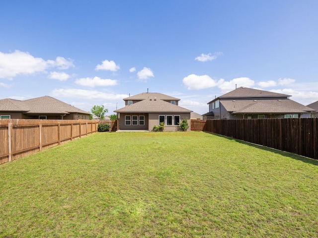 1213 Whipple Tree Trl, Georgetown, TX 78626 - back of property with a fenced backyard and a shingled roof