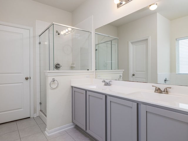 1213 Whipple Tree Trl, Georgetown, TX 78626 - full bath featuring a stall shower, double vanity, and tile patterned flooring