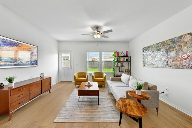 7506 Grenadine Bloom Bnd, Del Valle, TX 78617 - living room featuring ceiling fan and light wood finished floors