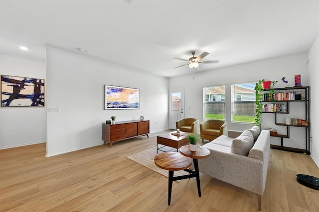 7506 Grenadine Bloom Bnd, Del Valle, TX 78617 - living room with light wood-type flooring and a ceiling fan