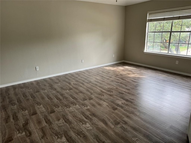 2606 Melba Pass, Cedar Park, TX 78613 - spare room featuring dark wood-style floors and baseboards