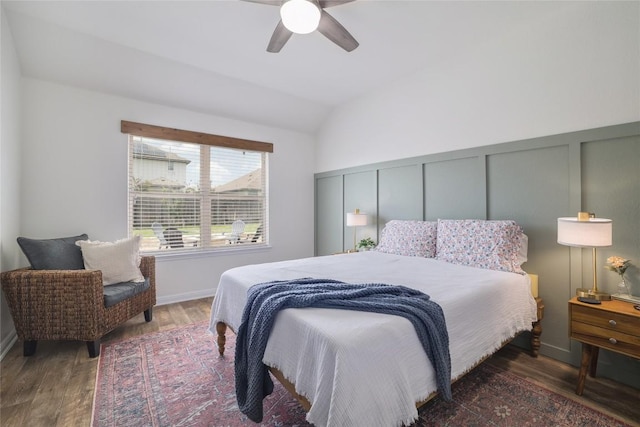 309 Callahan Ln, Leander, TX 78641 - bedroom with wood finished floors, vaulted ceiling, a decorative wall, and ceiling fan