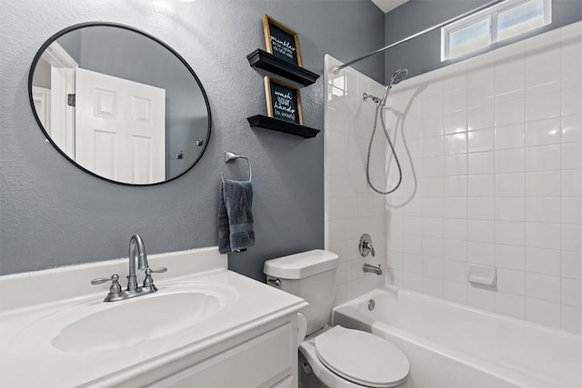 120 Spring Ct, Georgetown, TX 78633 - bathroom featuring a textured wall, toilet, shower / bath combination, and vanity