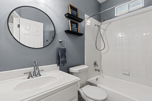 120 Spring Ct, Georgetown, TX 78633 - bathroom with toilet, a textured wall, shower / tub combination, and vanity