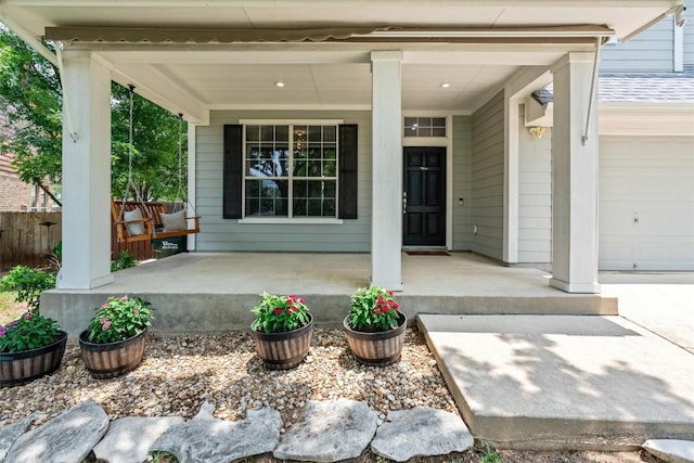 120 Spring Ct, Georgetown, TX 78633 - property entrance with a porch and an attached garage