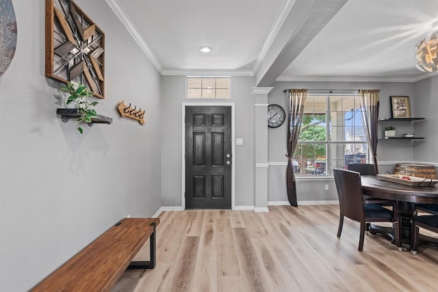 120 Spring Ct, Georgetown, TX 78633 - entryway featuring wood finished floors, ornamental molding, baseboards, and a chandelier