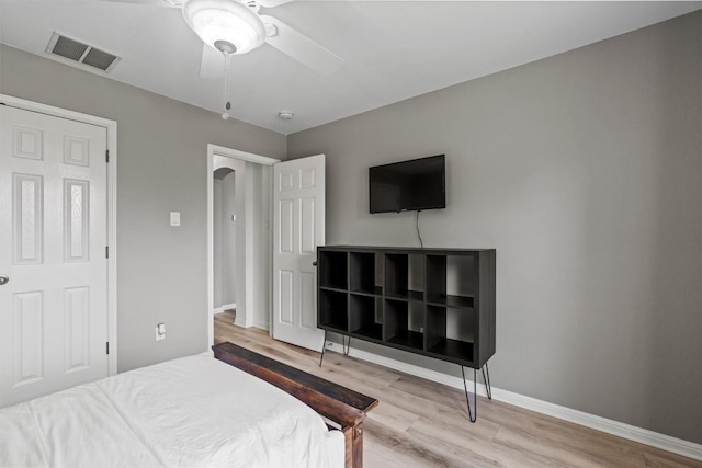 120 Spring Ct, Georgetown, TX 78633 - bedroom featuring wood finished floors, baseboards, and a ceiling fan