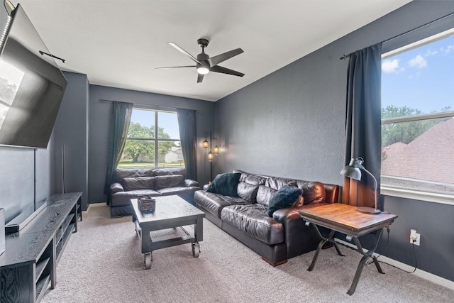 120 Spring Ct, Georgetown, TX 78633 - carpeted living area featuring a ceiling fan and baseboards