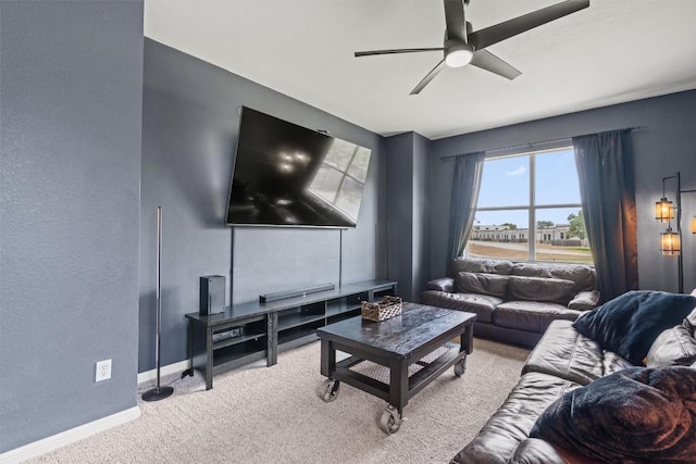 120 Spring Ct, Georgetown, TX 78633 - carpeted living area with ceiling fan, baseboards, and a textured wall