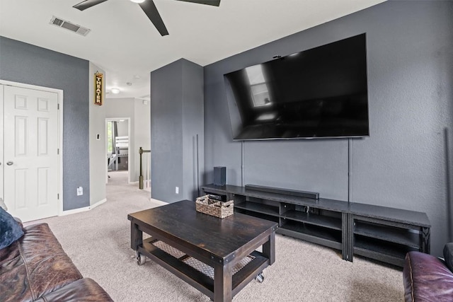 120 Spring Ct, Georgetown, TX 78633 - living room with carpet flooring, ceiling fan, and baseboards