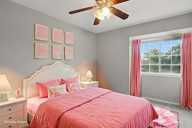 902 Valley Glen Cv, Pflugerville, TX 78660 - bedroom with carpet flooring, baseboards, and ceiling fan