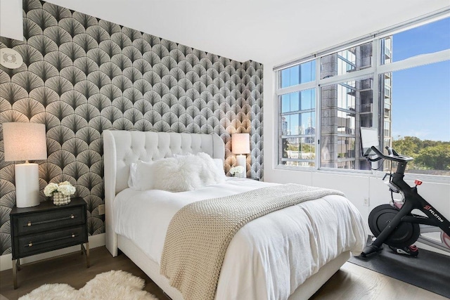 54 Rainey St Unit 617, Austin, TX 78701 - bedroom featuring wood finished floors