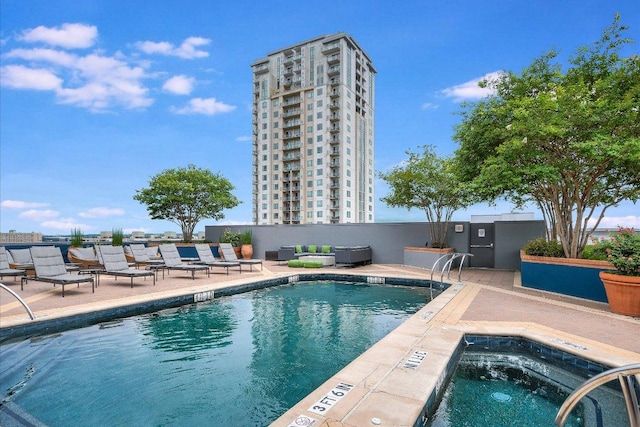 54 Rainey St Unit 617, Austin, TX 78701 - community pool featuring a community hot tub and a patio area