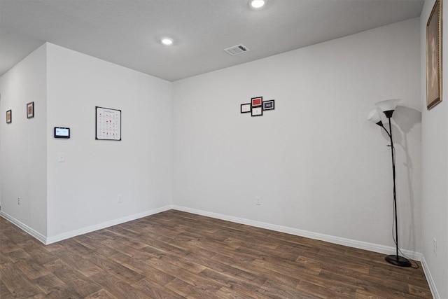 204 Connor Ln, Georgetown, TX 78626 - unfurnished room featuring recessed lighting, dark wood-type flooring, and baseboards