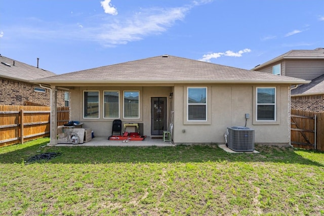 204 Connor Ln, Georgetown, TX 78626 - back of property with a patio area, stucco siding, and central AC unit