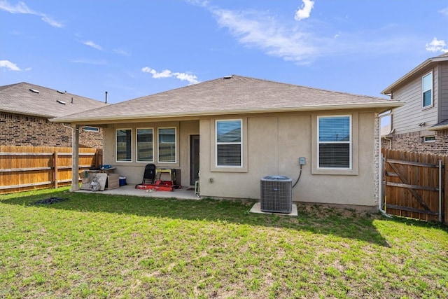 204 Connor Ln, Georgetown, TX 78626 - back of house featuring central air condition unit, stucco siding, and a patio area
