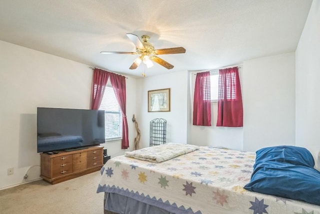 101 Cannery Cv, Leander, TX 78641 - bedroom with carpet flooring and a ceiling fan
