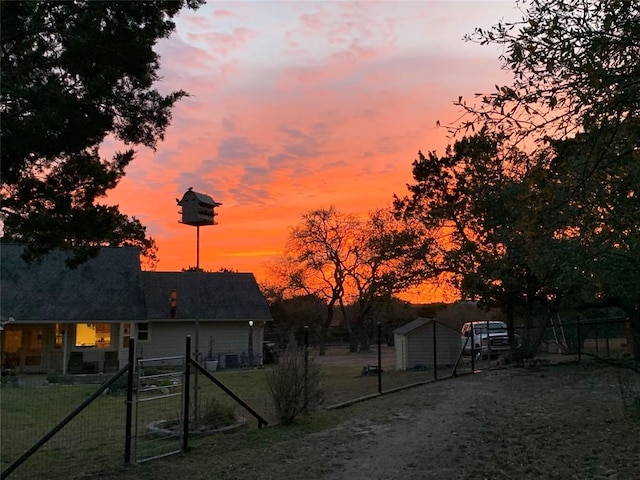 1005 Westland Ridge Rd, Dripping Springs, TX 78620 - view of back of property at dusk