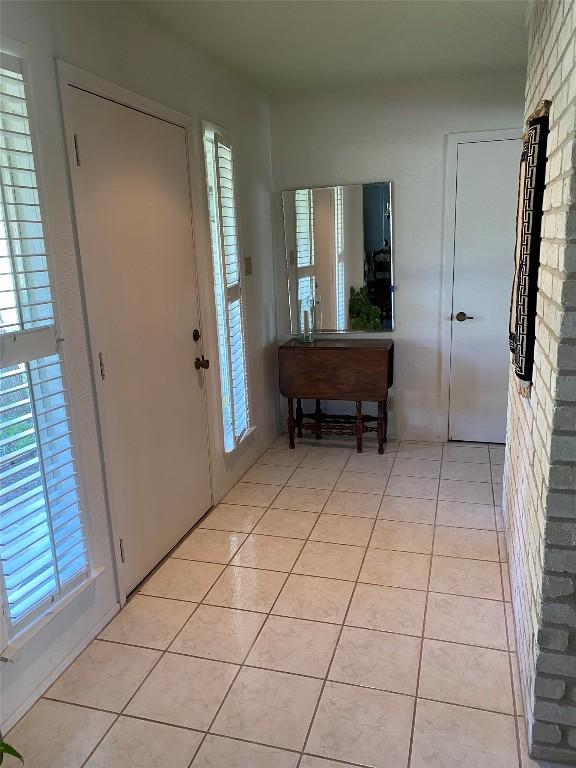 4105 Val Verde Dr, Georgetown, TX 78628 - entrance foyer featuring healthy amount of natural light and light tile patterned flooring