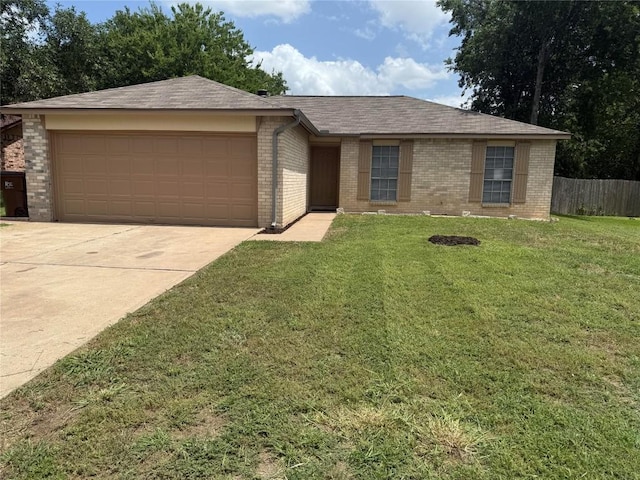 905 Rolling Green Dr, Round Rock, TX 78664 - single story home with a garage, brick siding, driveway, and a shingled roof