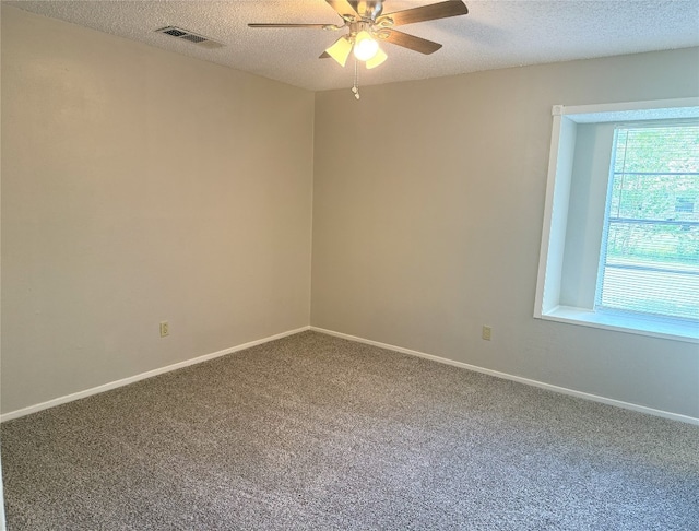 905 Rolling Green Dr, Round Rock, TX 78664 - empty room featuring a ceiling fan, carpet floors, a textured ceiling, and baseboards